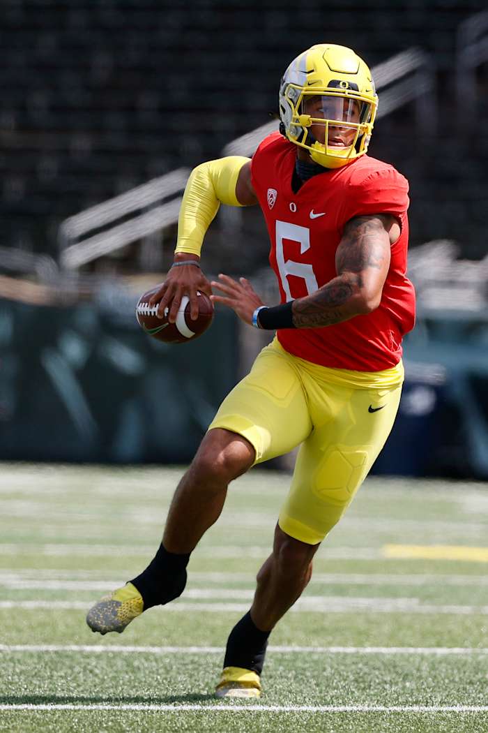 Robby Ashford is the most athletic quarterback on the Oregon roster, also starring for Mark Wasikowski's baseball team in the spring.
